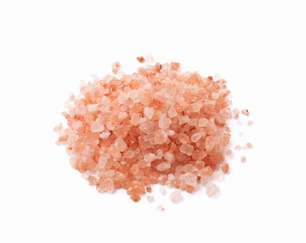 istock Himalaya or Himalayan rock salt over white background 911313966