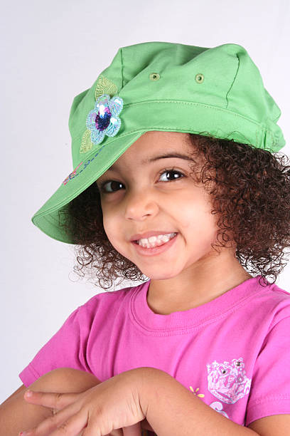 A pretty child with blonde ringlets.