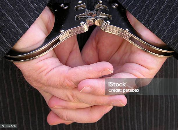 Handcuffed - zdjęcia stockowe i więcej obrazów Areszt - Areszt, Autorytet, Biznes