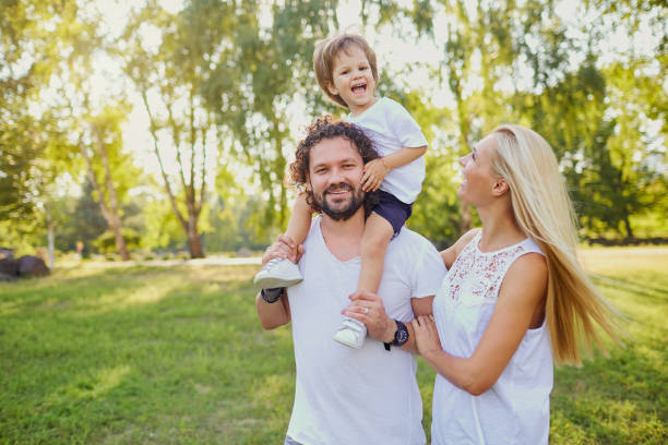 istock Happy family in the park 911326316