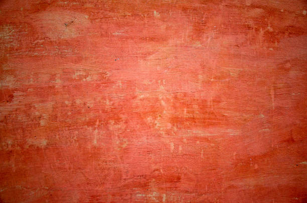 istock Red wall of village house 911326342