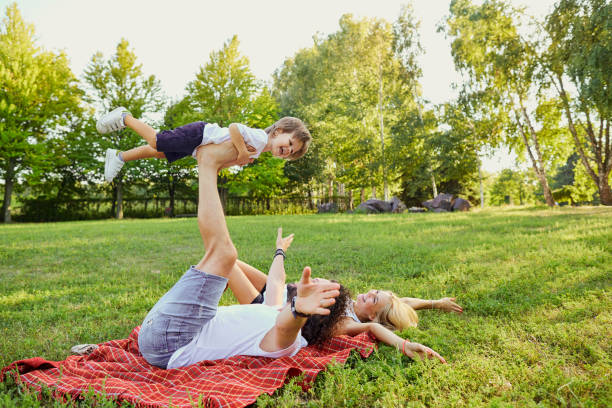 istock Happy family in the park 911329228