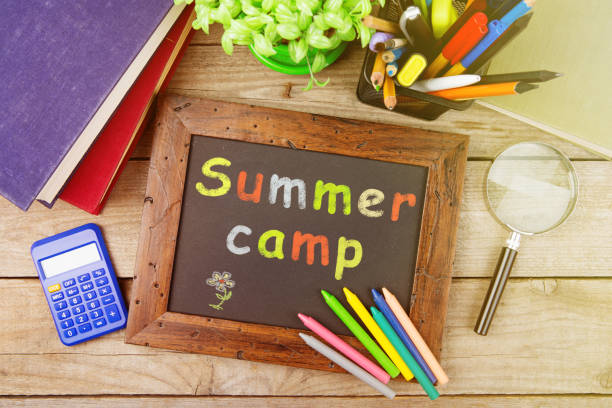 istock school supplies and blackboard with copy space on table 911332760