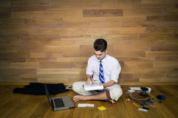 Businessman is resting on the bench in New York City