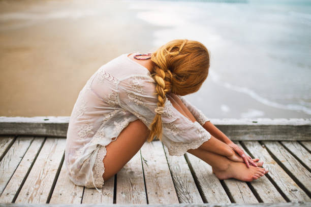 Dreamy girl on beach