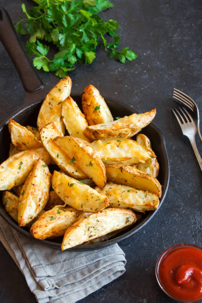 istock Baked potato wedges 911351634