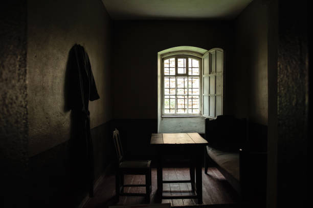 istock Dark vintage jail room 911352490