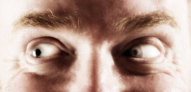 istock Man looks slightly manic and crazed 911366246