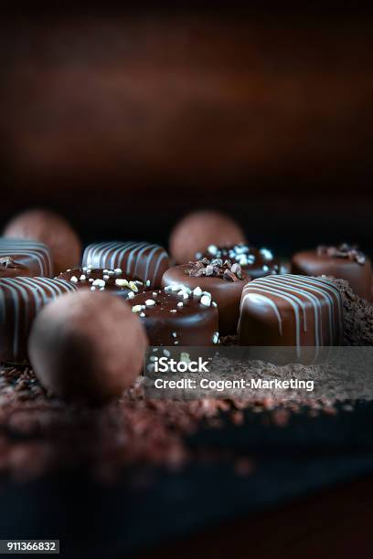 Handmade Dark Chocolates Stock Photo - Download Image Now - Chocolate, Chocolate Pieces, Luxury