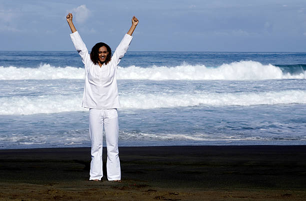 victory of young mixed woman stock photo