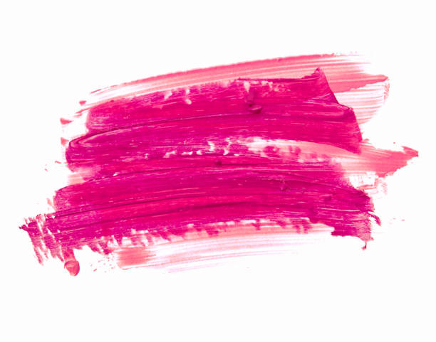 istock Pink lipstick smeared on white. Cosmetic product. 911369848