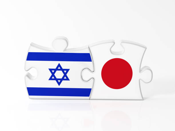 istock Jigsaw Puzzle Pieces Textured With Israeli And Japanese Flags 911377440
