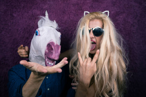 istock Two funny persons on the purple background 911378272