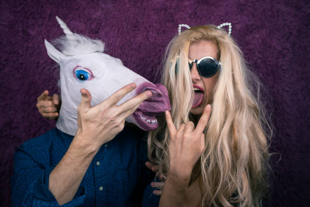 istock Crazy unicorn with expressive young woman 911378276