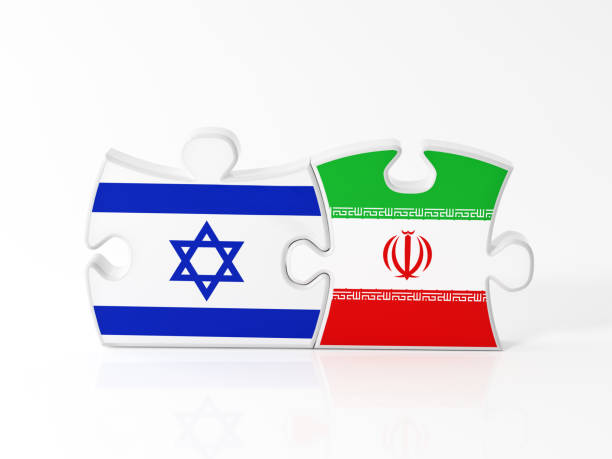 istock Jigsaw Puzzle Pieces Textured With Israeli And Iranian Flags 911380136