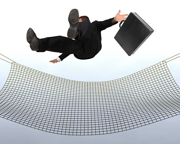 Businessman falling stock photo
