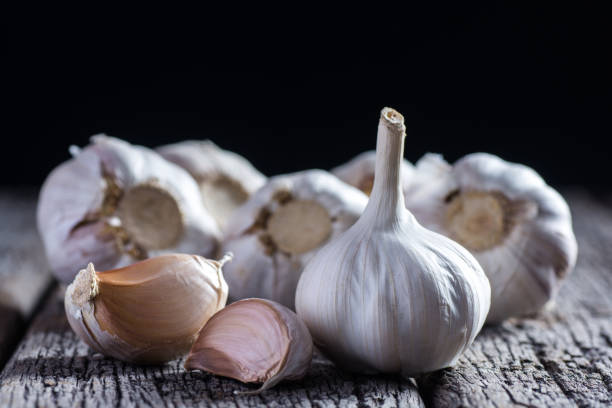 istock Organic garlic whole and cloves 911394460