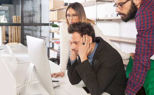 istock Worried business team 911394740