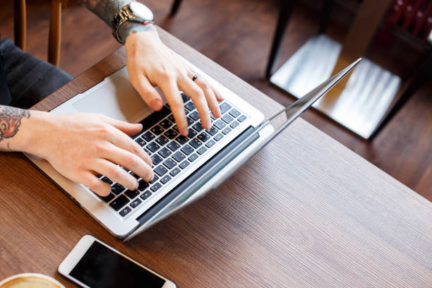 istock Typing on keyboar of laptop 911397014