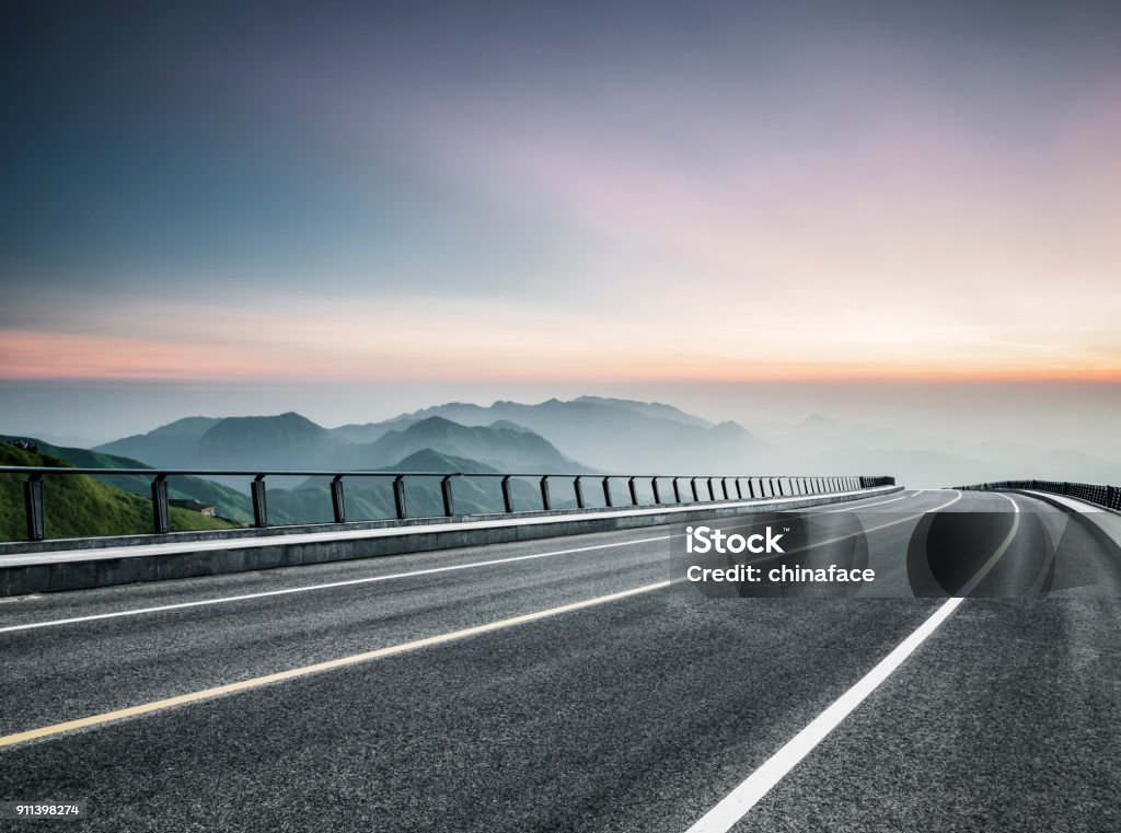 empty road travel through mountain range empty road travel through mountain range,China,Asia. Empty Road Stock Photo