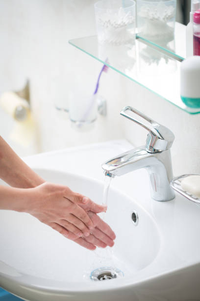 istock The boy is washing his hands 911398696