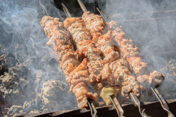 istock Shish kebab or shashlik roasting 911404592