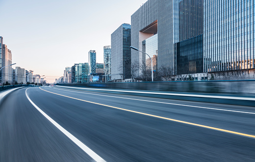empty urban road with city skyline on background,Beijing,China,Asia.