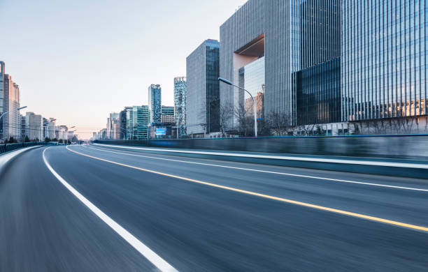 inner city road empty urban road with city skyline on background,Beijing,China,Asia. city street stock pictures, royalty-free photos & images