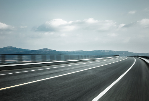 empty road travel through mountain range,China,Asia.