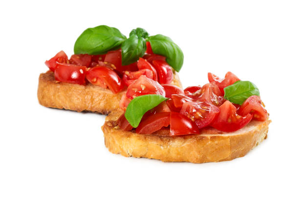 istock Two bruschetta with fresh tomato and basil 911412662