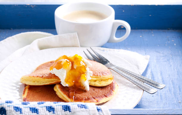 istock Pancakes with cream and marmalade 911415992