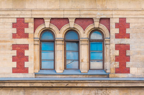 istock Windows in row on facade of historic building 911416170