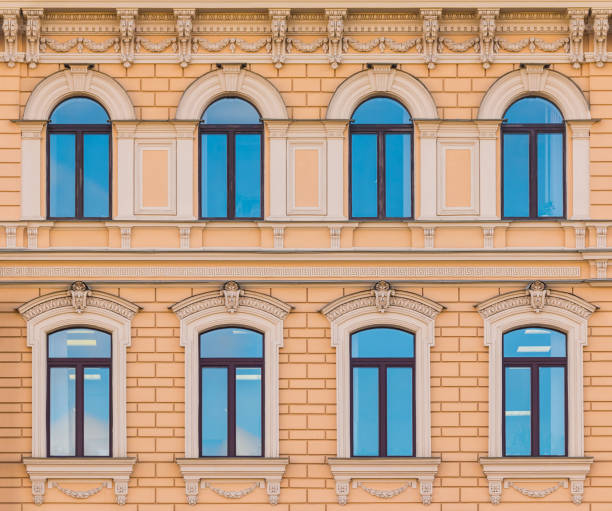 istock Windows in row on facade of historic building 911418448