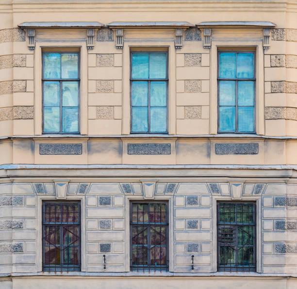 istock Windows in row on facade of historic building 911419078