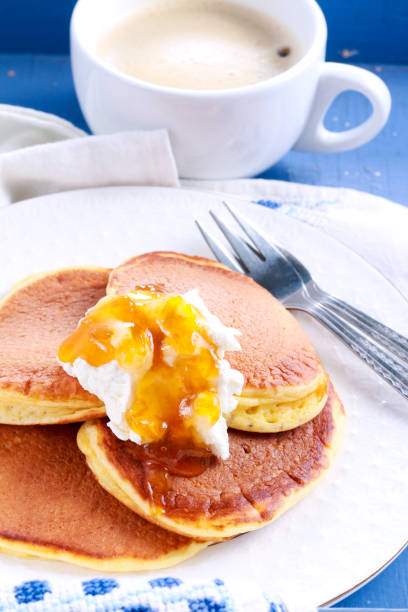istock Pancakes with cream and marmalade 911420062