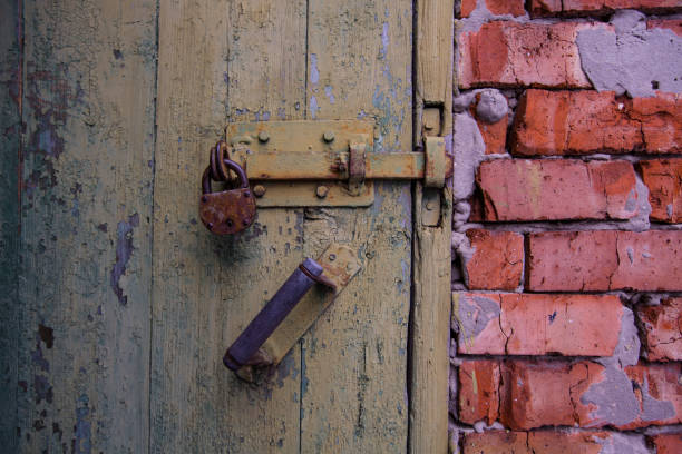 istock old wrought-iron door with a bolt 911423476