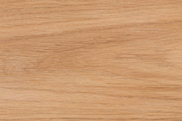 A fragment of a wooden panel hardwood A fragment of a wooden panel hardwood. Hi res photo. oak wood grain stock pictures, royalty-free photos & images