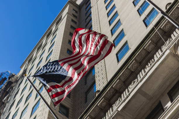 istock American Flag Flying In City 911435666