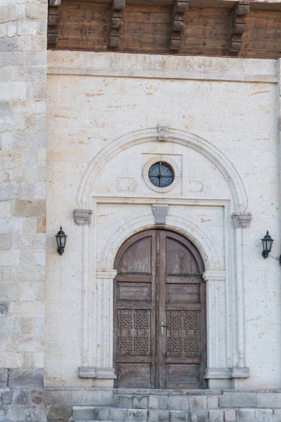 istock Old fashioned stone house doors 911438870