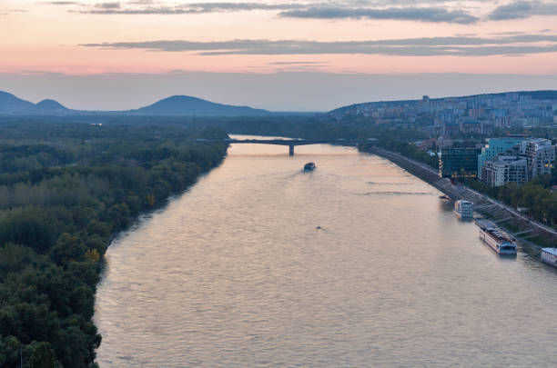 istock Danube river and Bratislava cityscape at sunset, Slovakia. 911456044