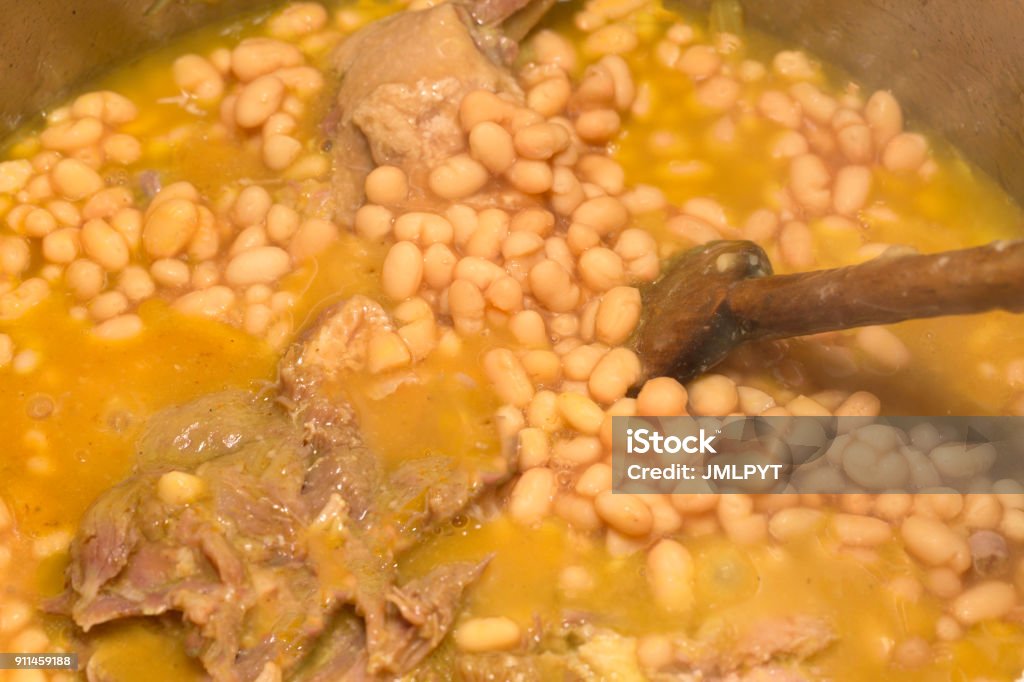 Cassoulet : french meat Cassoulet is a regional specialty of Languedoc, made from dry beans, usually white, and meat. At its origin, it was based on beans. The cassoulet takes its name from the terracotta enamelled terracotta made in Issel. Bean Stock Photo