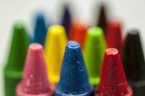 istock Close-up of colorful crayons tips 911459242