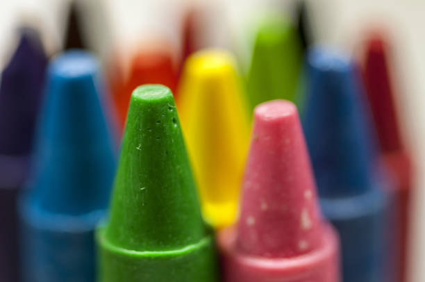 istock Close-up of colorful crayons tips 911459246