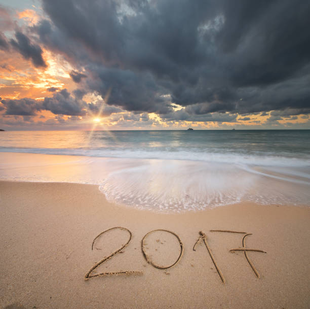 istock 2017 year on the sea shore. 911473426