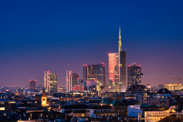 Milan skyline Milan skyline by night, new skyscrapers with colored lights. milan stock pictures, royalty-free photos & images