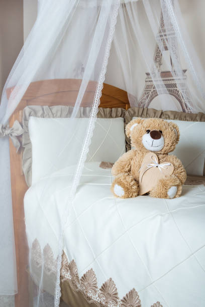 istock Crib in the children's room. 911473918