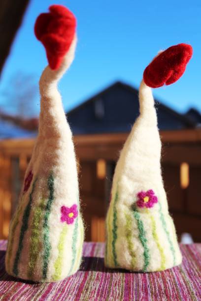 istock Funny egg warmer made of felt on the balcony, Easter 911474606
