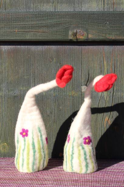 istock Funny egg warmer made of felt on the balcony, Easter 911474694