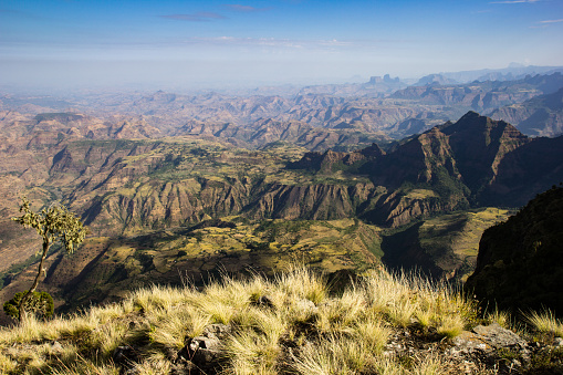 view of the Simien mountains with farming activity in the foreground
