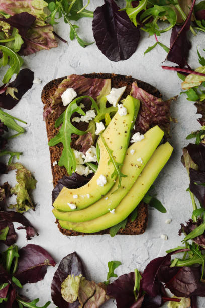 istock Bruschetta with avocado, greens and cottage cheese 911480490